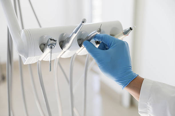 Professional Wisdom Tooth Removal technician working in Falls Church city County, VA